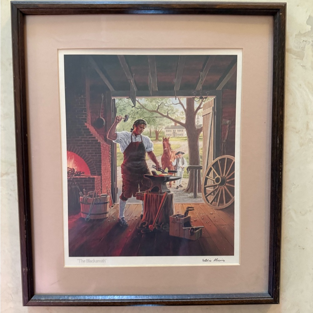 Framed picture of “The Blacksmith” By Uldis Klavins